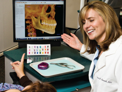 Dentist reviewing a digital x-ray at Lakewood Dental Arts in Lakewood, CA