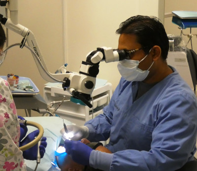Dentist working with advanced technology at Lakewood Dental Arts in Lakewood, CA