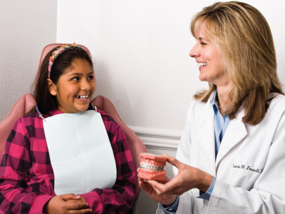 Photograph of doctor with patient at Lakewood Dental Arts in Lakewood, CA